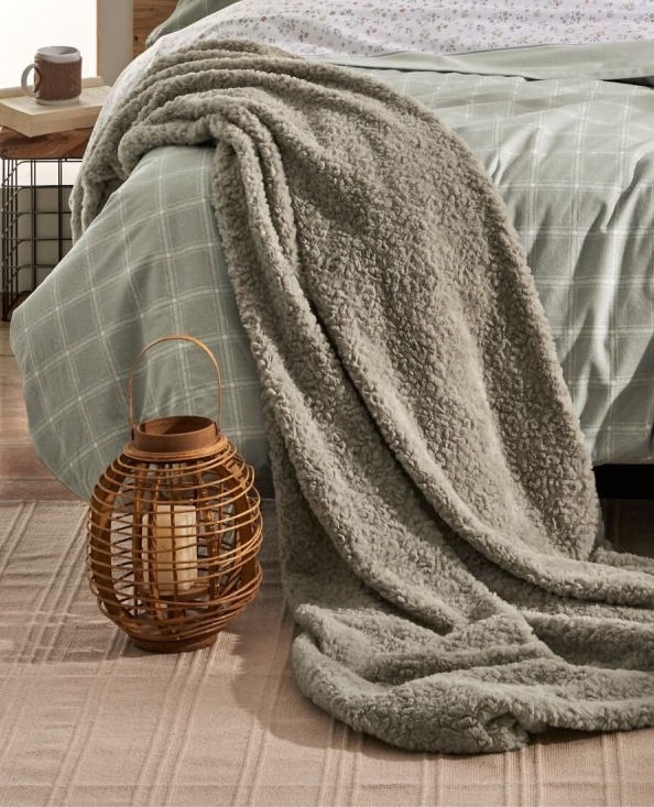Plaid decorativo en tonos verdes
